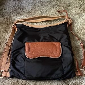 Sondra Roberts nylon black bag with brown leather accents! ✈️ 👜